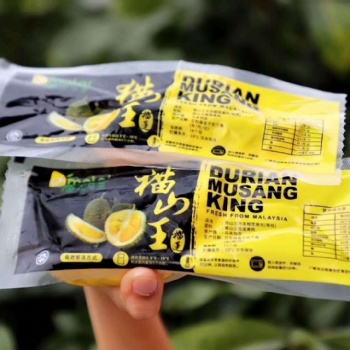 供应全自动榴莲果肉真空包装机
